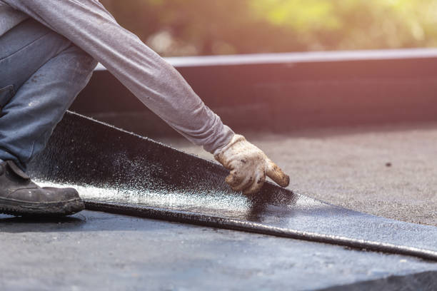 Professional Waterproofing technician working in Painesville, OH